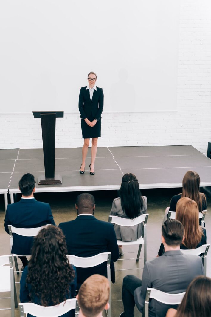 Speaker on a staged platform